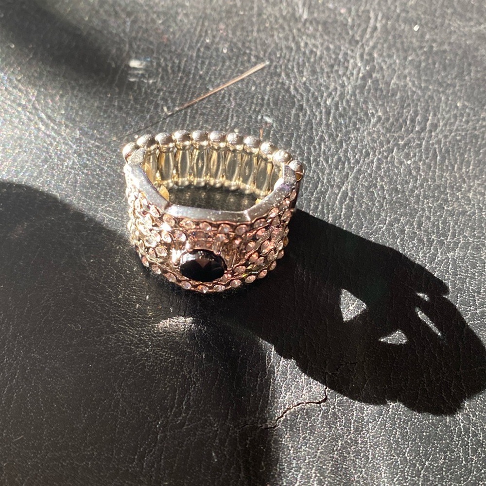 Paparazzi cocktail ring. Cz and simulated black stone